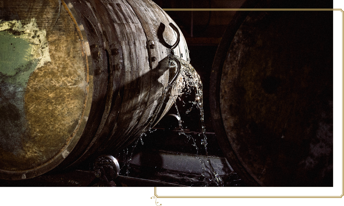 Bourbon cascading from a cask